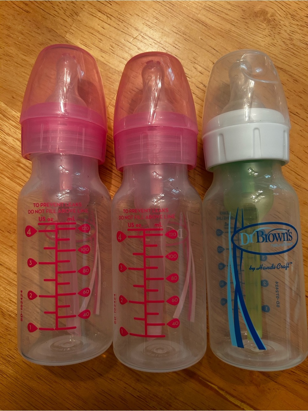 Dr. Brown's Clear Baby Bottle + Two Pink-Top Bottles